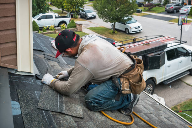 Professional Roof Replacement technician working in Wheeling, IL